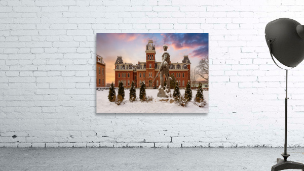 Mountaineer statue against Woodburn Hall Wall Preview