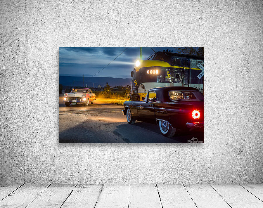 Two vintage cars racing to railroad crossing Wall Preview