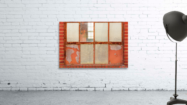 Old rusty window in warehouse painted red and orange Wall Preview