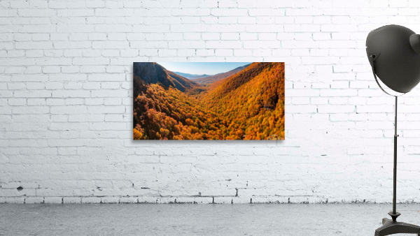 Aerial view of Smugglers Notch with fall trees in Vermont Wall Preview