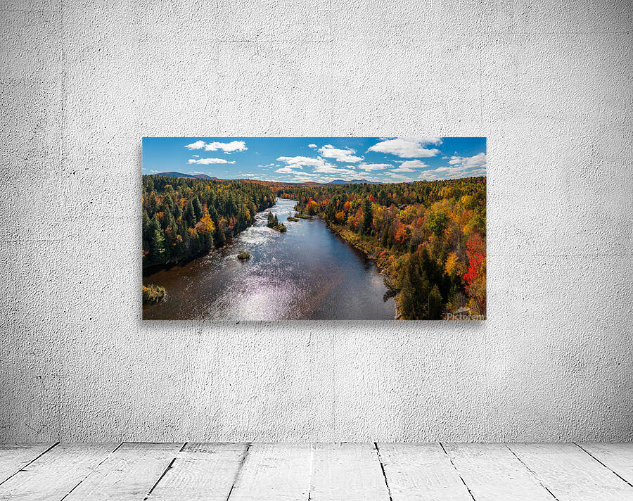 Saranac river flows through multi-colored fall landscape in Adir Wall Preview
