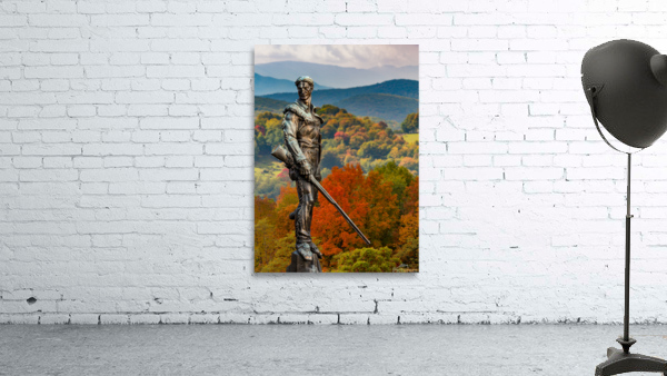 Mountaineer statue from WVU with fall leaves in West Virginia Wall Preview