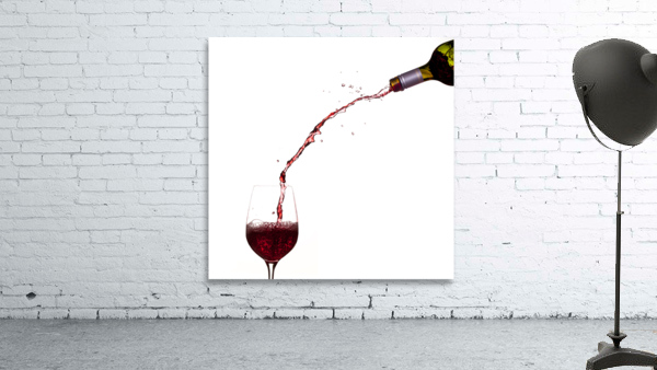 Wine pouring from bottle into glass Wall Preview