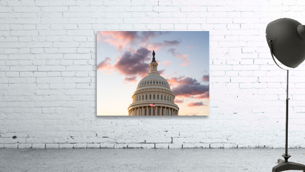 Flag flies in front of Capitol in DC at sunrise Wall Preview