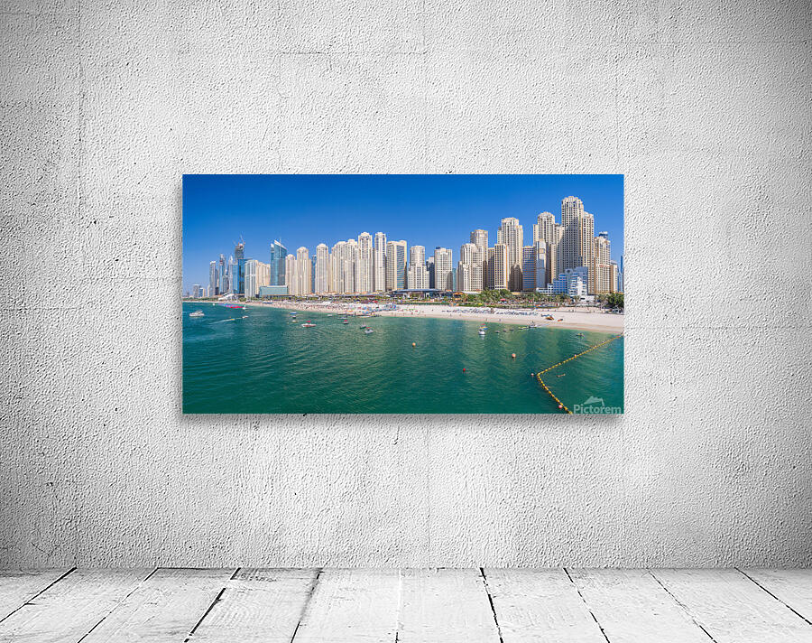 Skyline of hotels in JBR Beach above the sand and oceanfront Wall Preview