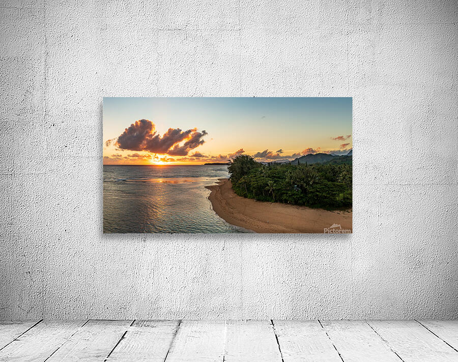 Wide panoramic view of sunrise over Tunnels Beach Kauai Hawaii Wall Preview