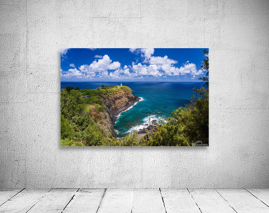Kilauea lighthouse on headland against blue sky on Kauai Wall Preview