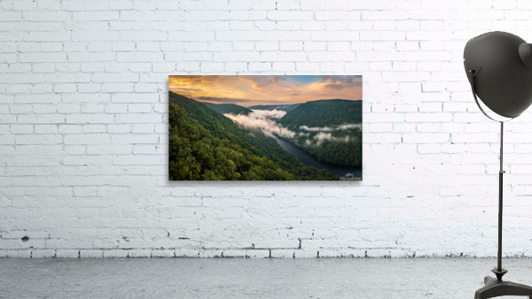 Mist swirling over Cheat River gorge at sunrise near Morgantown  Wall Preview