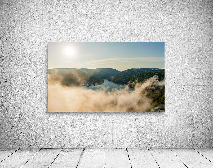 Mist rises from Cheat Lake in the early morning as the sun rises Wall Preview