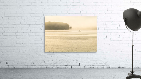 Fisherman fishing in Mississippi river on misty autumn morning Wall Preview