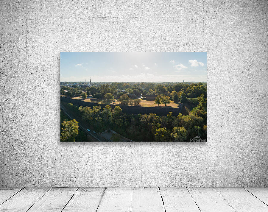 Townscape of Natchez in Mississippi with old mansion grounds Wall Preview