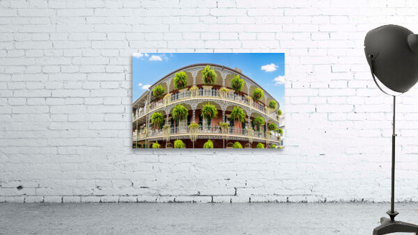 Traditional wrought iron balcony on Royal Street New Orleans hou Wall Preview