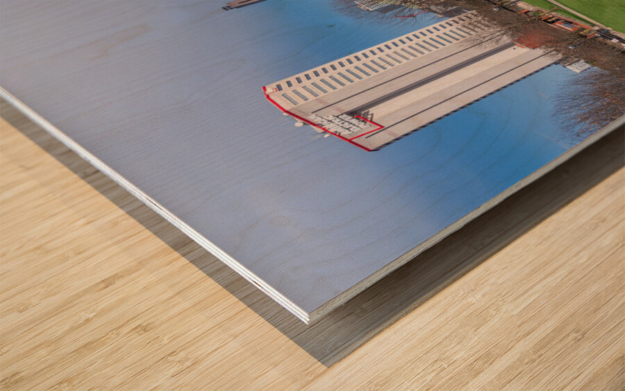 Columbus Ohio waterfront skyline behind railroad truss bridge Wood print