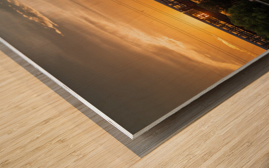 Freight train on the railroad bridge in Austin at sunset Wood print