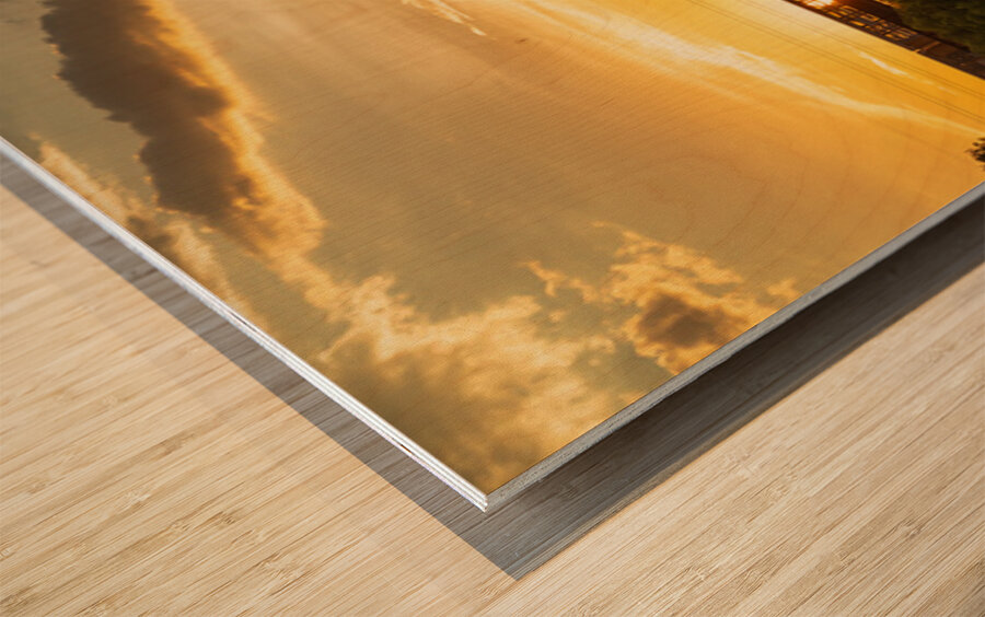 Freight train on the railroad bridge in Austin at sunset Wood print