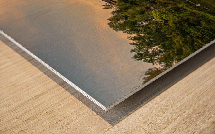 Hotel at dawn by River Wenatchee in Alpine German town of Leaven Wood print