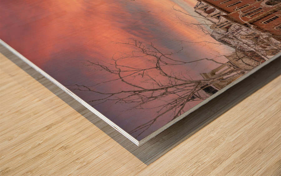 Sunset over snow covered Woodburn Hall at WVU Wood print