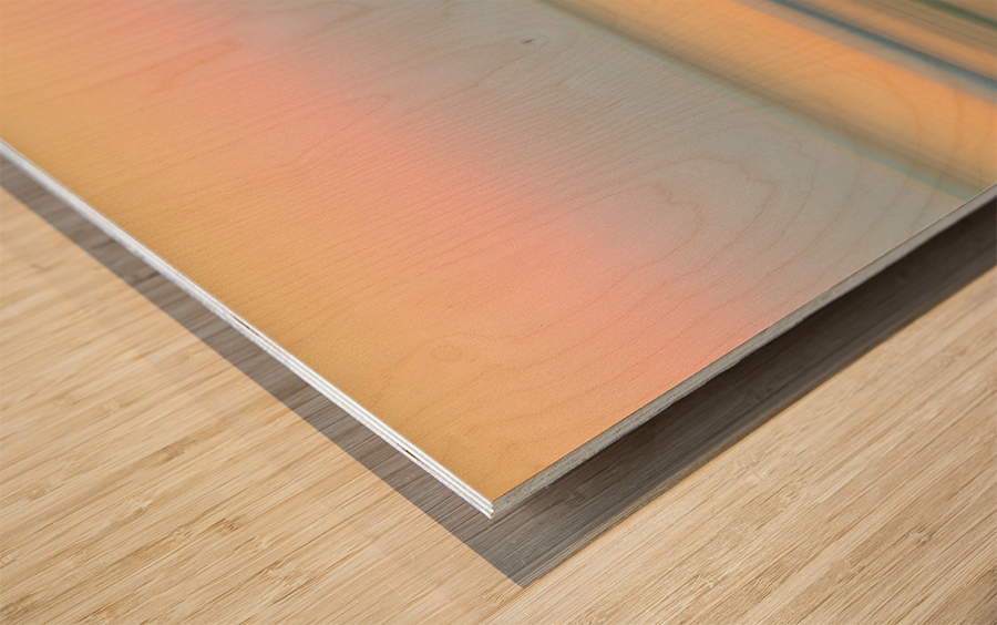 Sunrise over ocean with sideways pan Wood print