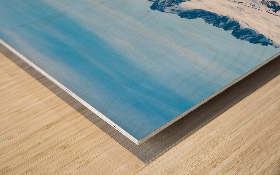 Majestic mountains of Thompson Pass rise over trees Wood print