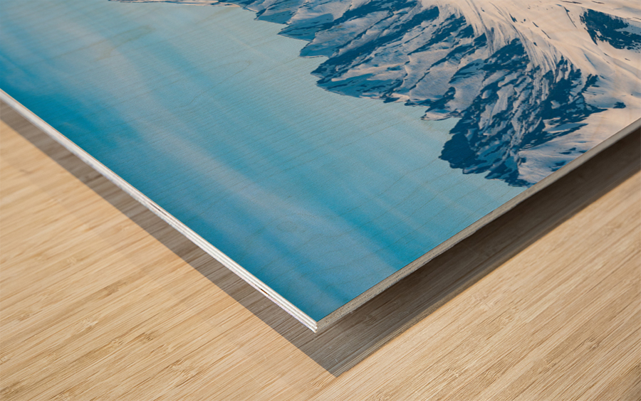 Majestic mountains of Thompson Pass rise over trees Wood print