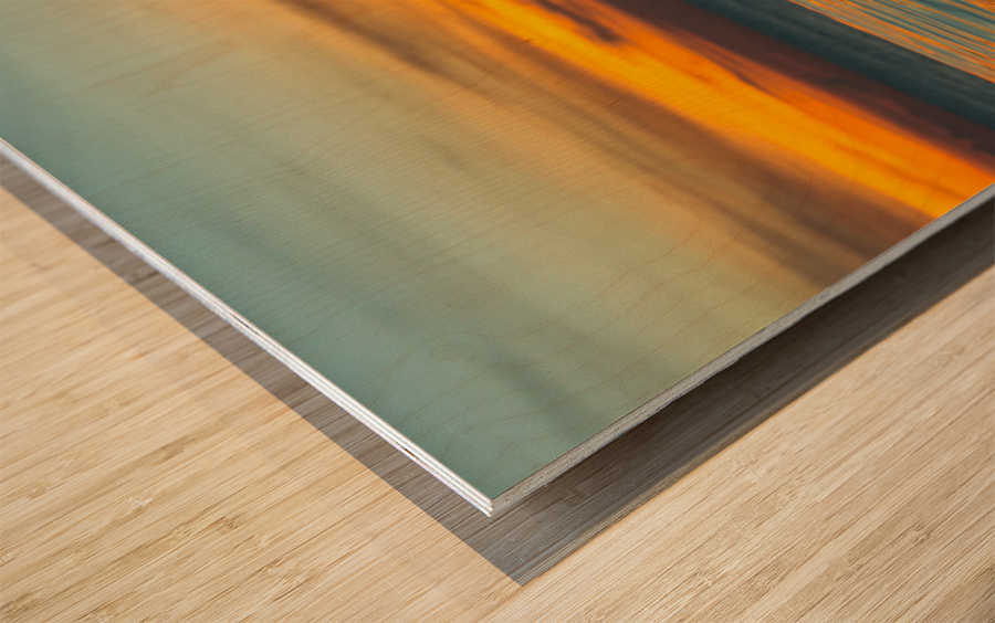 Infinity edge pool with sea underneath sunset Impression sur bois