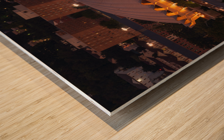 Illuminted Coliseum at WVU at dusk Wood print