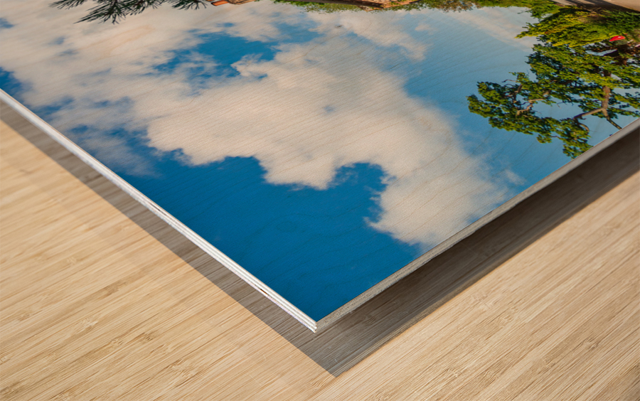 Ancient pub or restaurant on small road Wood print