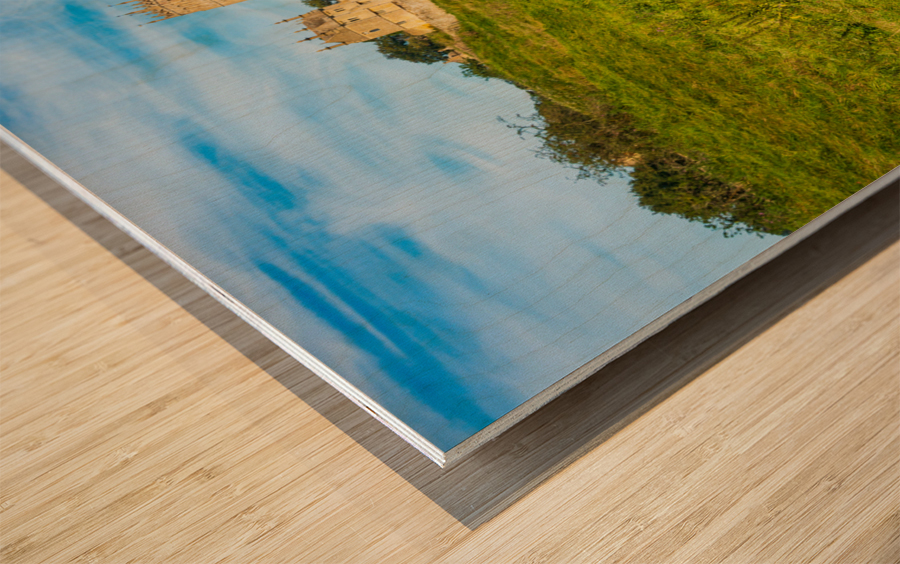 Church St James across sheep in Chipping Campden Wood print