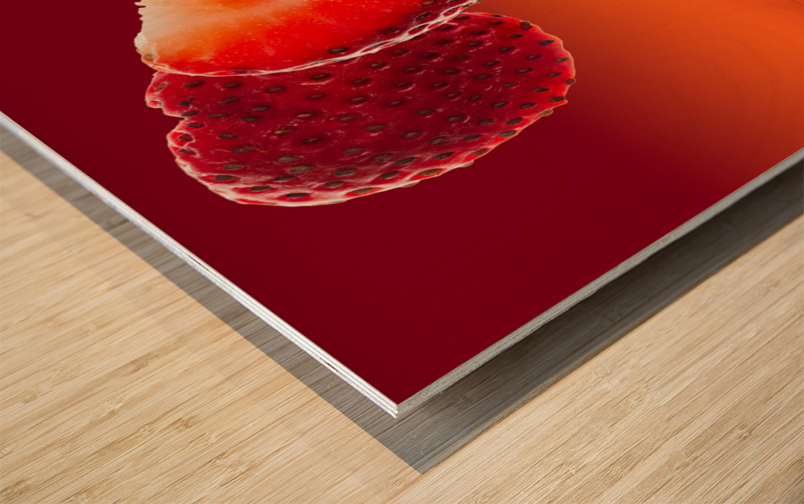 Fresh heart shaped strawberry reflected Wood print