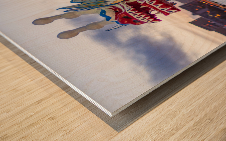 Carved head of dragon canoe Wood print