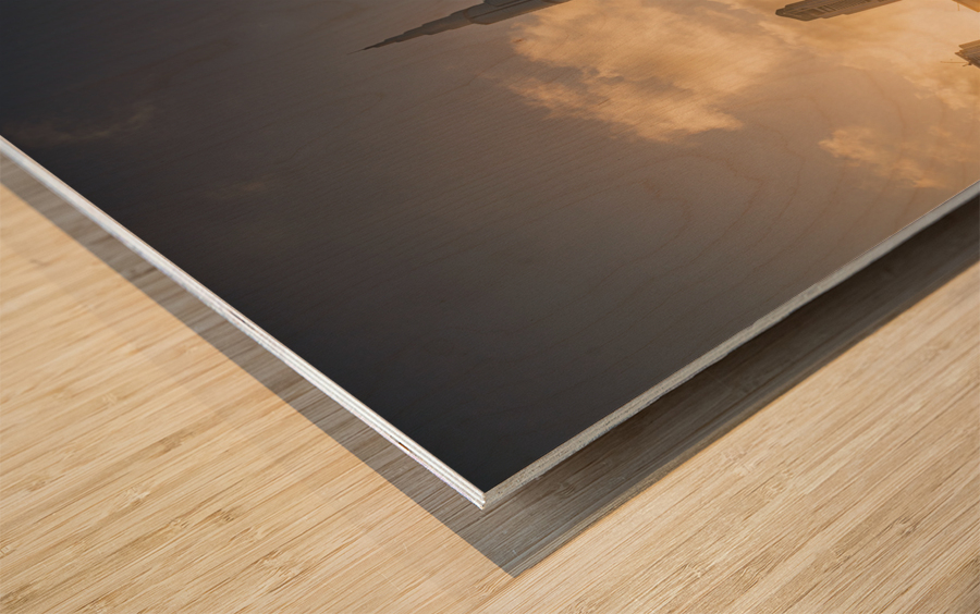 Sunset over the Dubai downtown business district Wood print