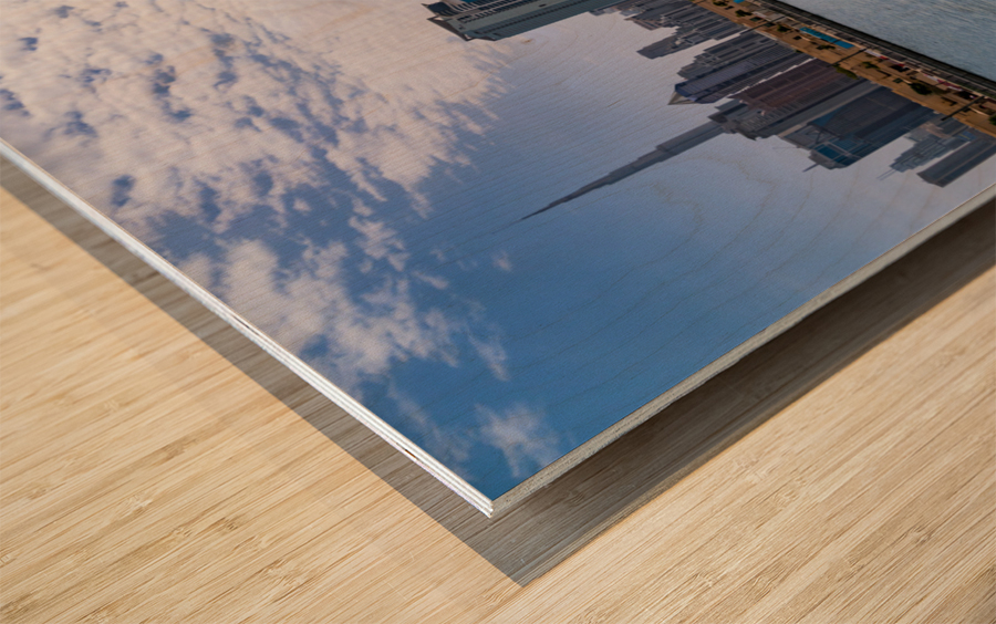 Low rise homes in front of modern apartments of Dubai Downtown d Wood print