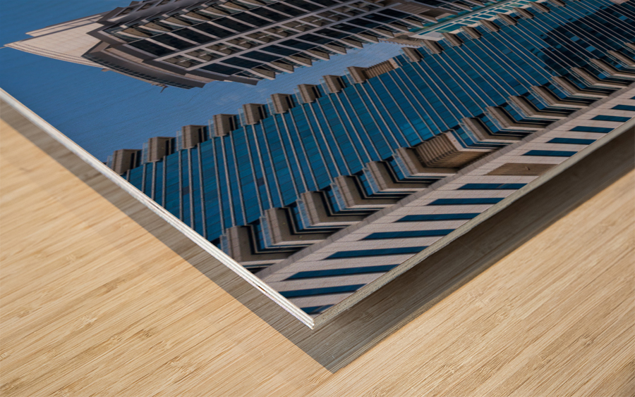 Mosque among towers on the waterfront at Dubai Marina UAE Wood print