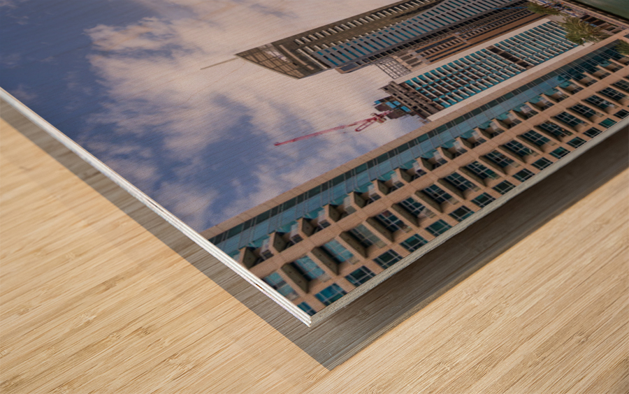 Modern buildings crowd the waterfront at Dubai Marina UAE Wood print
