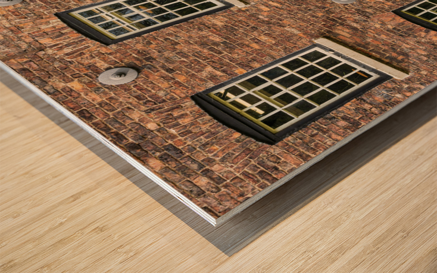 Restored industrial cotton mill with pattern of windows Wood print