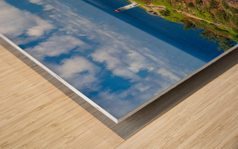 Kilauea lighthouse on headland against blue sky on Kauai Wood print