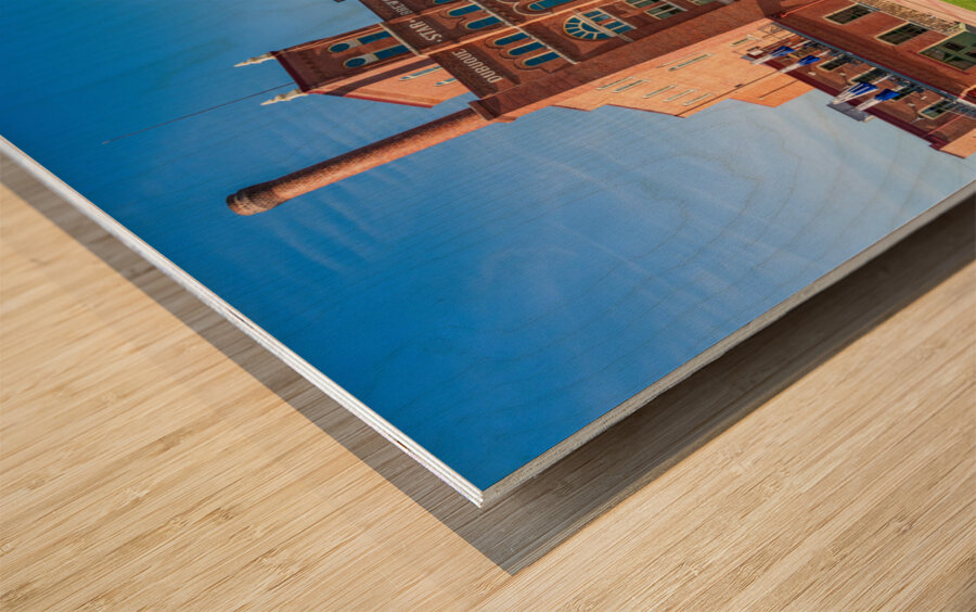 Historic Dubuque Star Brewery alongside Mississippi river Wood print