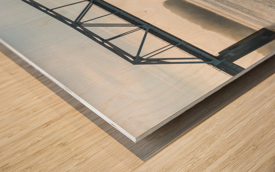 Fisherman fishing in Mississippi river on misty autumn morning Wood print