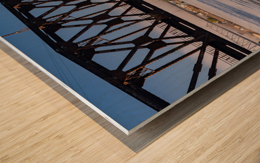 River cruise boat docked in Dubuque IA under Railroad bridge Wood print
