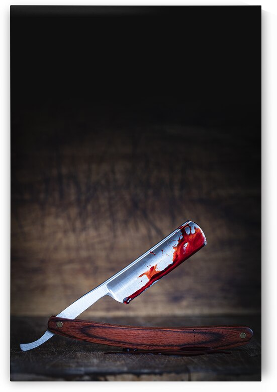 traditional razor covered in blood  by Gualtiero Boffi