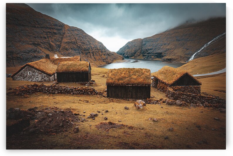 houses with grass roofs in Saksun on the Faroe Islands. by Gualtiero Boffi