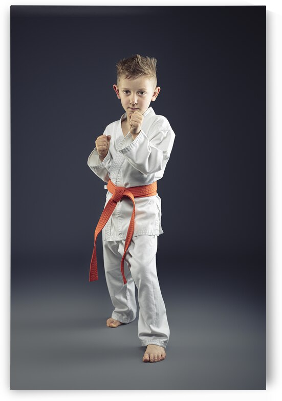 portrait of a child with kimono practicing martial arts by Gualtiero Boffi