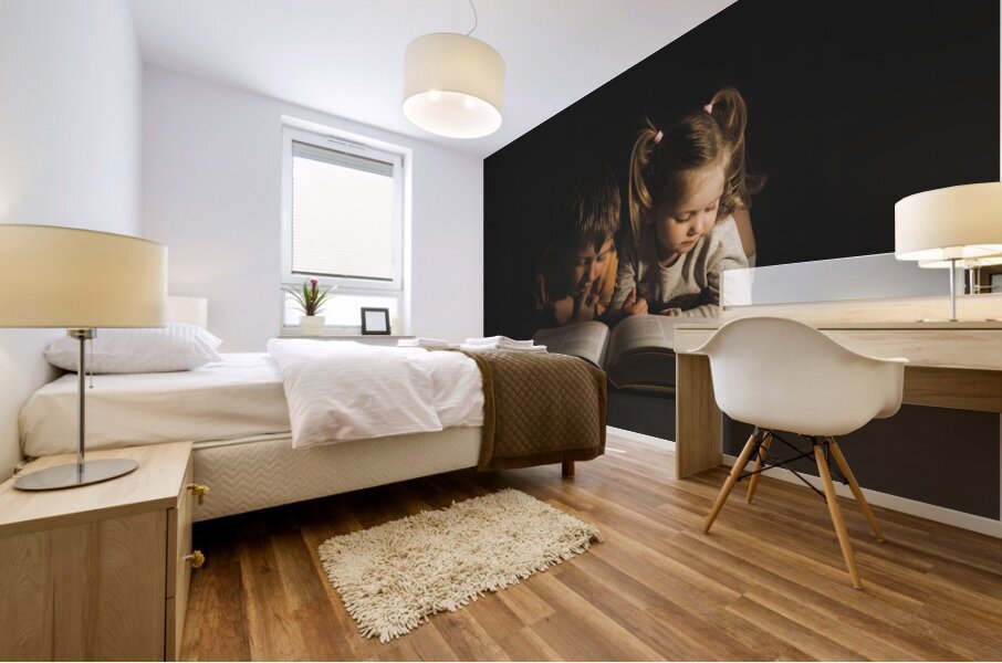 children lying reading a book Impression murale