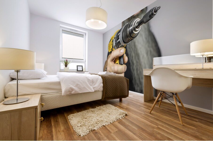 worker with electric screwdriver Mural print