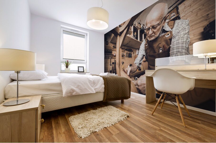 old carpenter at work Mural print