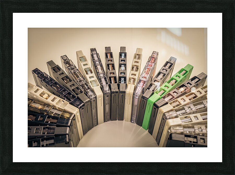 old cassettes arranged in an arc background Picture Frame print