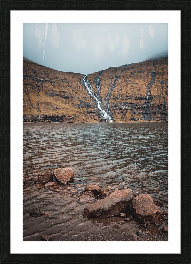 waterfalls that flow into the lake of Saksun in the Faroe Picture Frame print