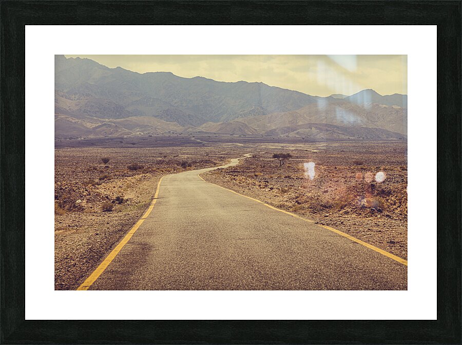 desert road leading to wadi rum Jordan. Picture Frame print