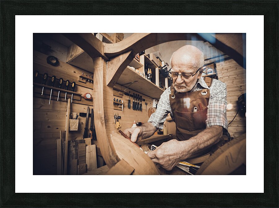 old carpenter at work Picture Frame print
