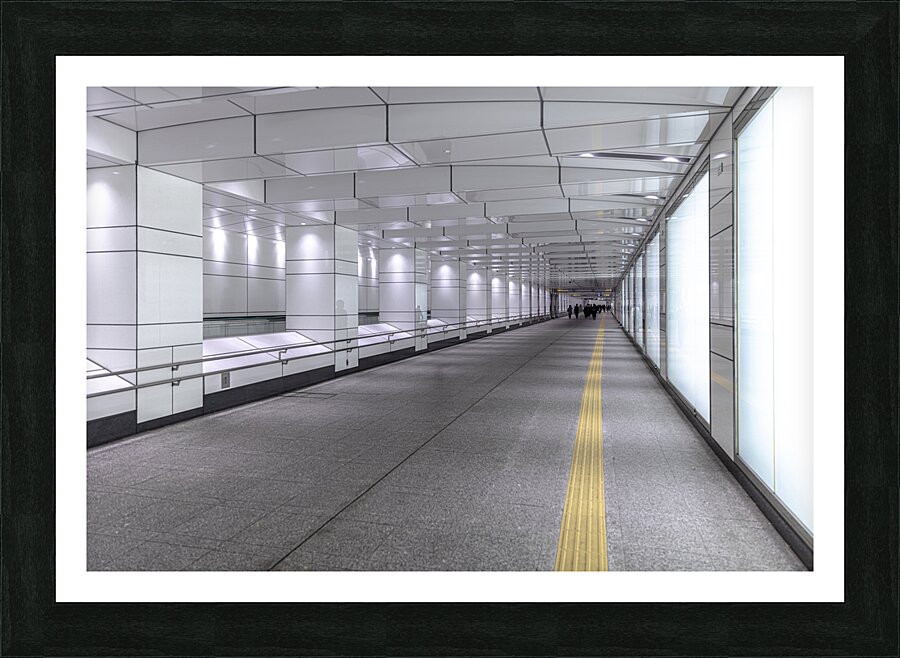 Empty illuminated underground passage Picture Frame print